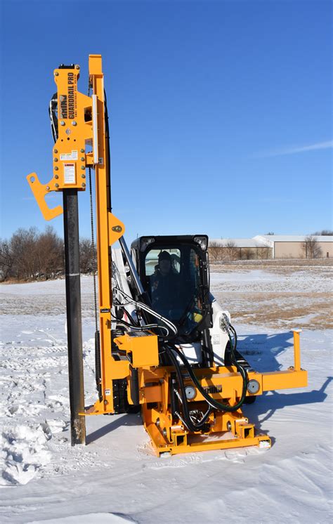 guardrail post driver skid steer|skid steer guardrail attachment.